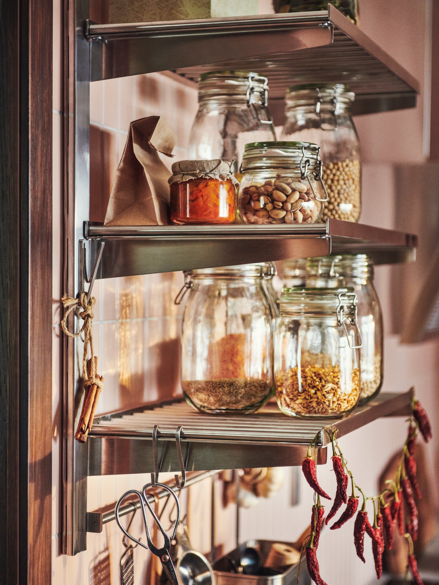 A clear glass KORKEN jar with lid