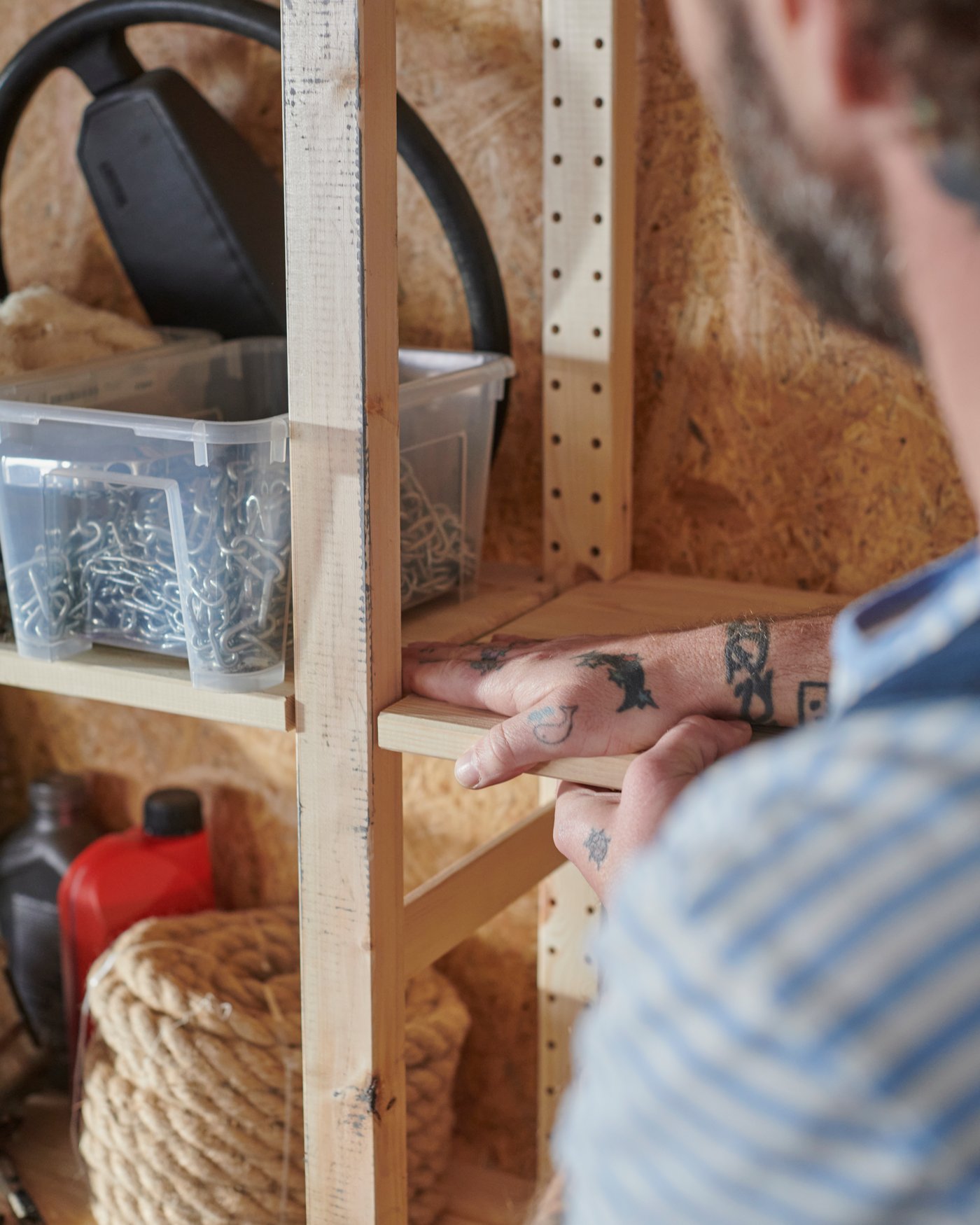 A pine IVAR shelving unit in the childrens room