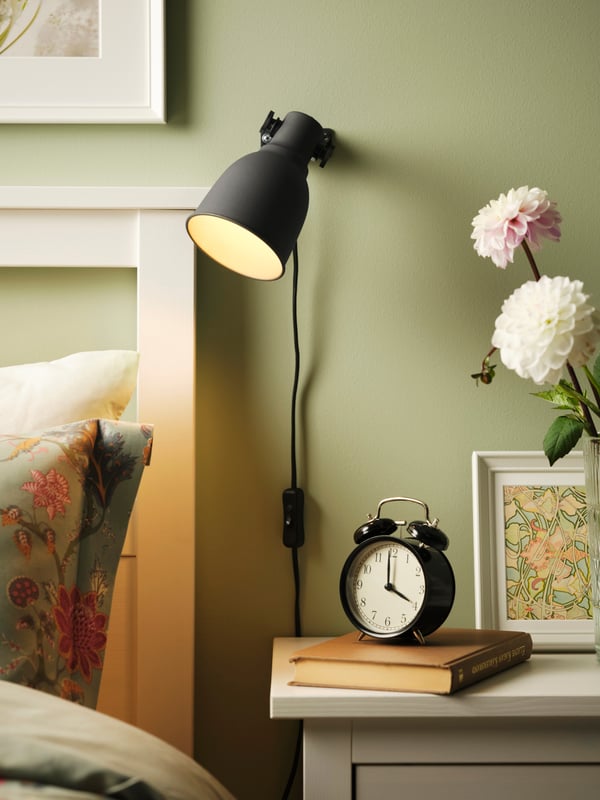 A dark grey HEKTAR wall/clamp spotlight