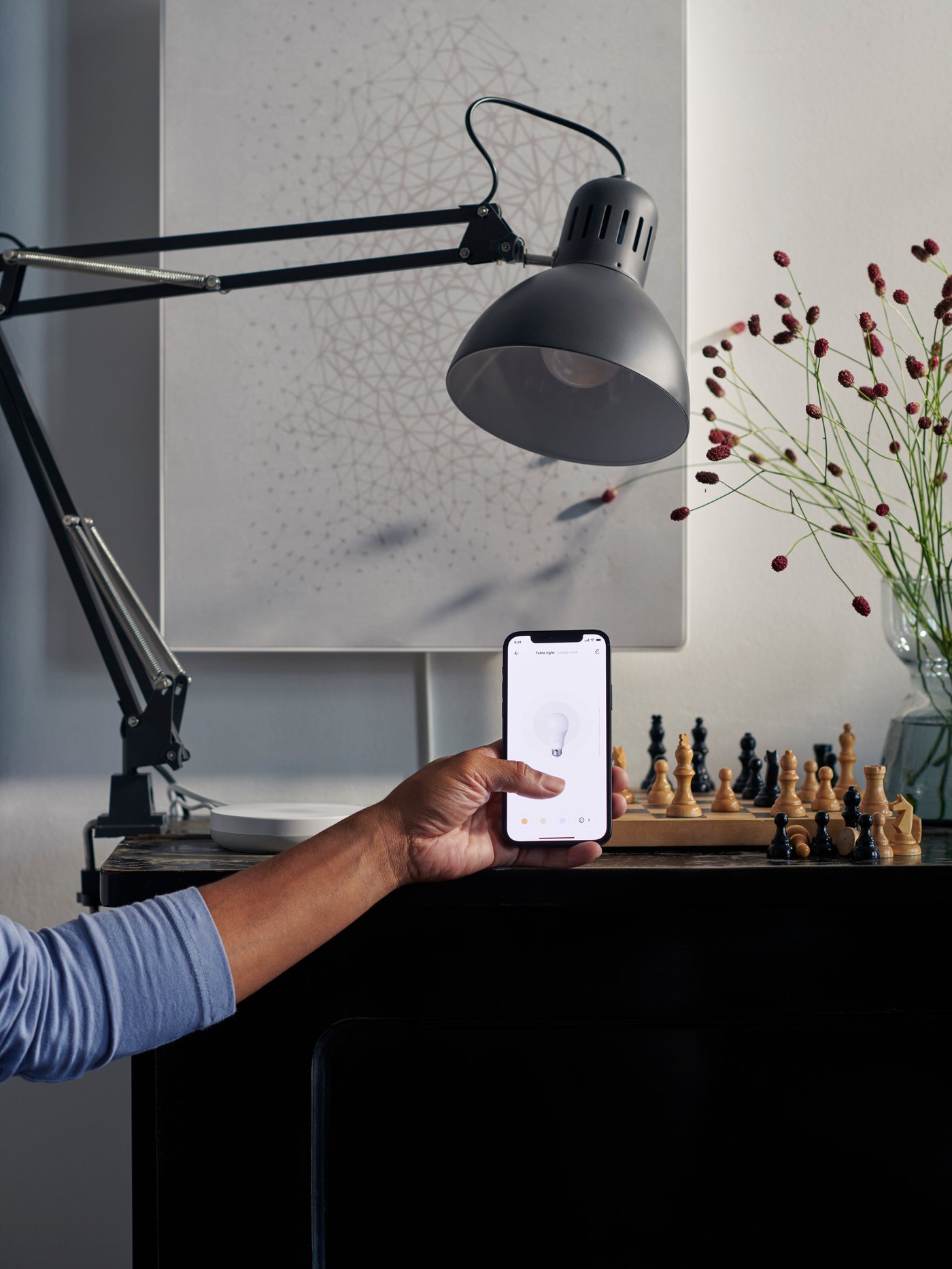 A white smart DIRIGERA hub for smart products