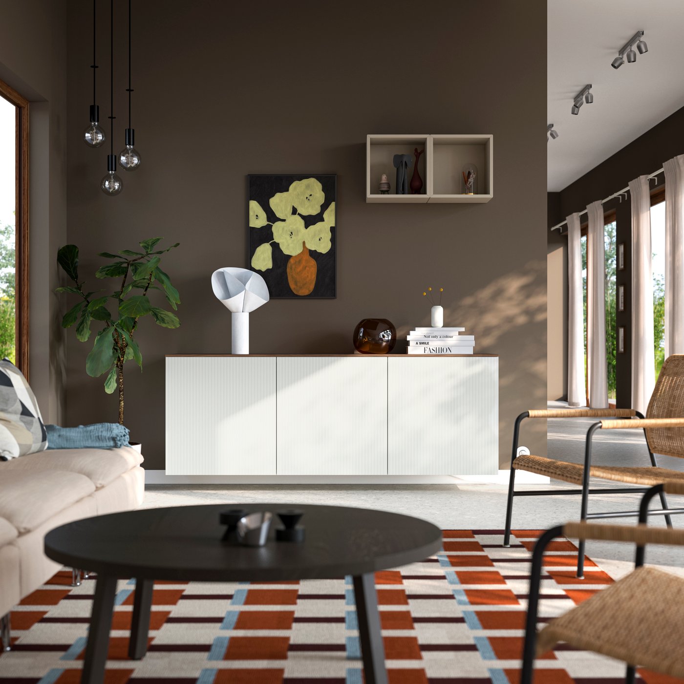 A white BESTÅ wall mounted storage combination, with a black coffee table and MARKBLÅMME rug.