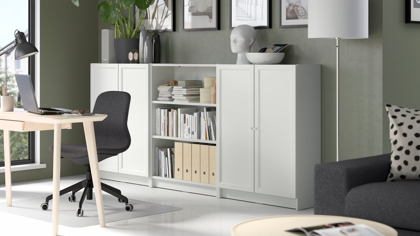A white BILLY bookcase combination with doors in the home office