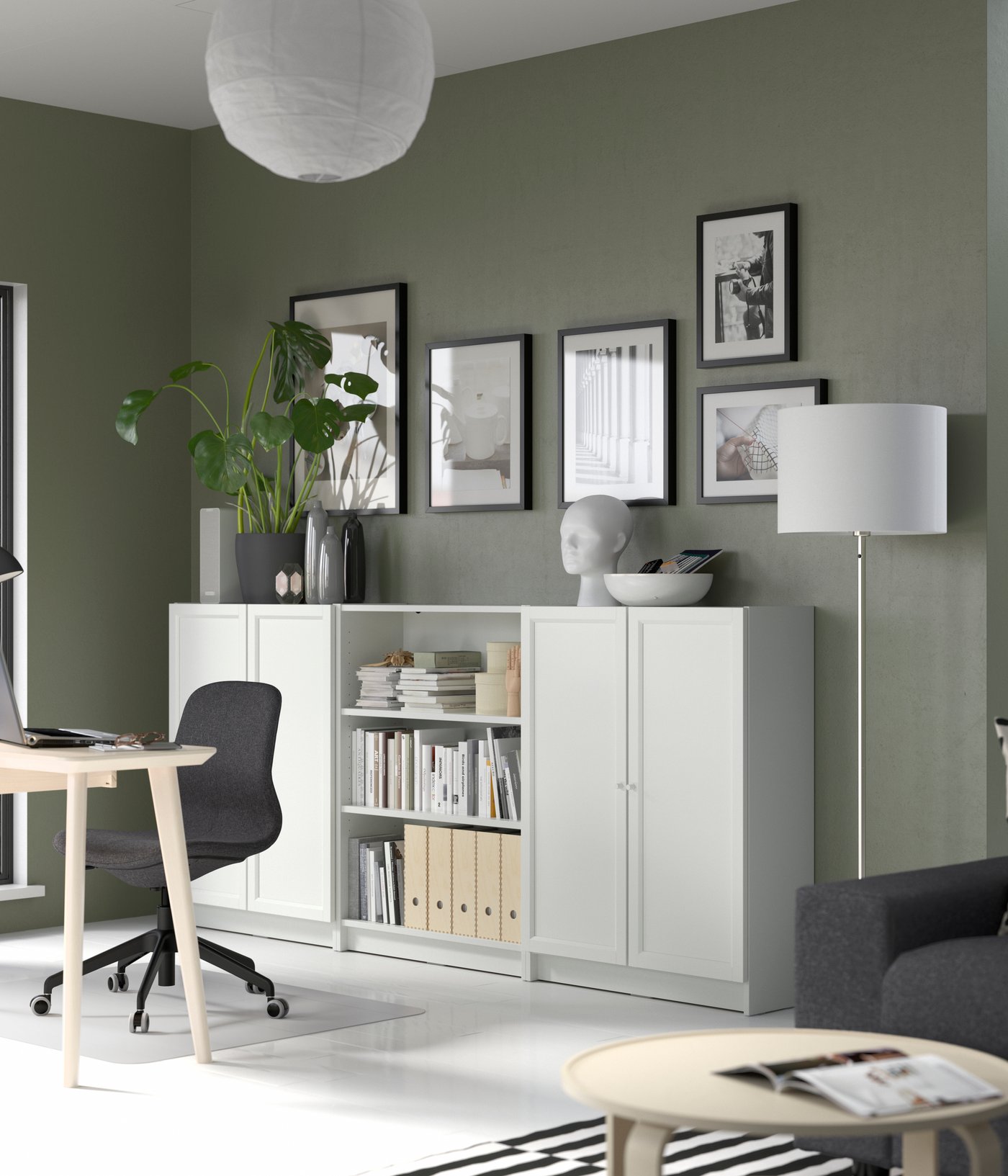 A white BILLY bookcase combination with doors in the home office