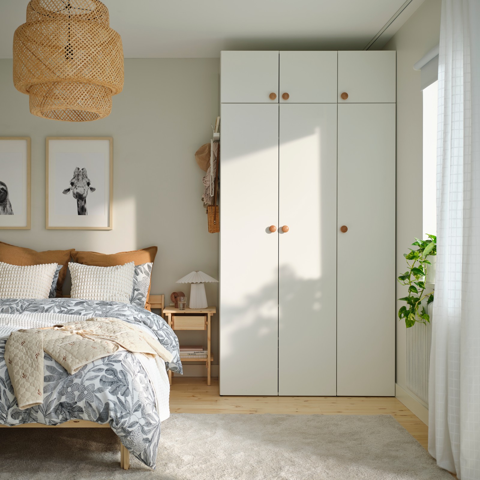 A dark beige DYTÅG cushion cover in the bedroom