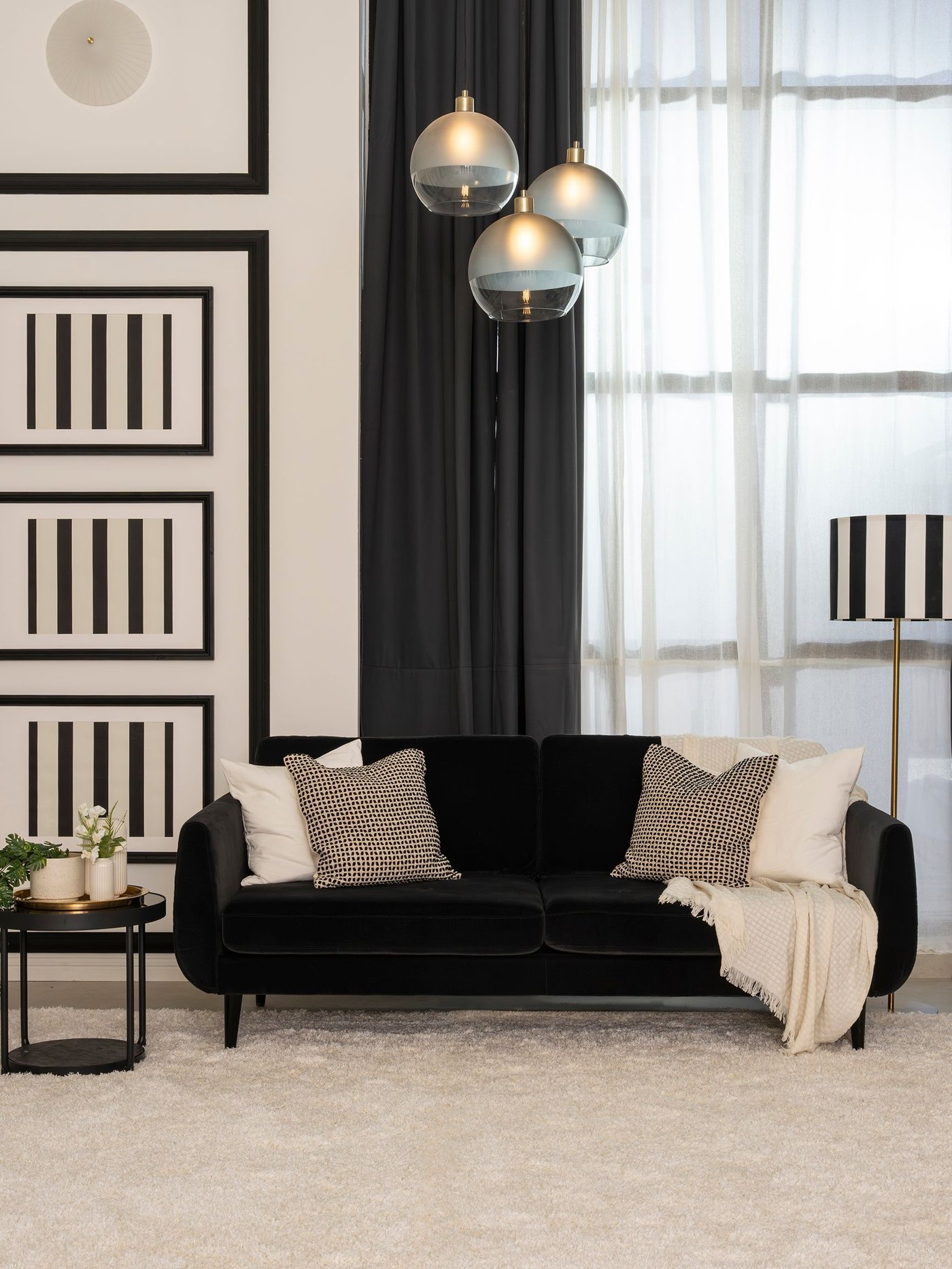 An off-white HORNMAL throw