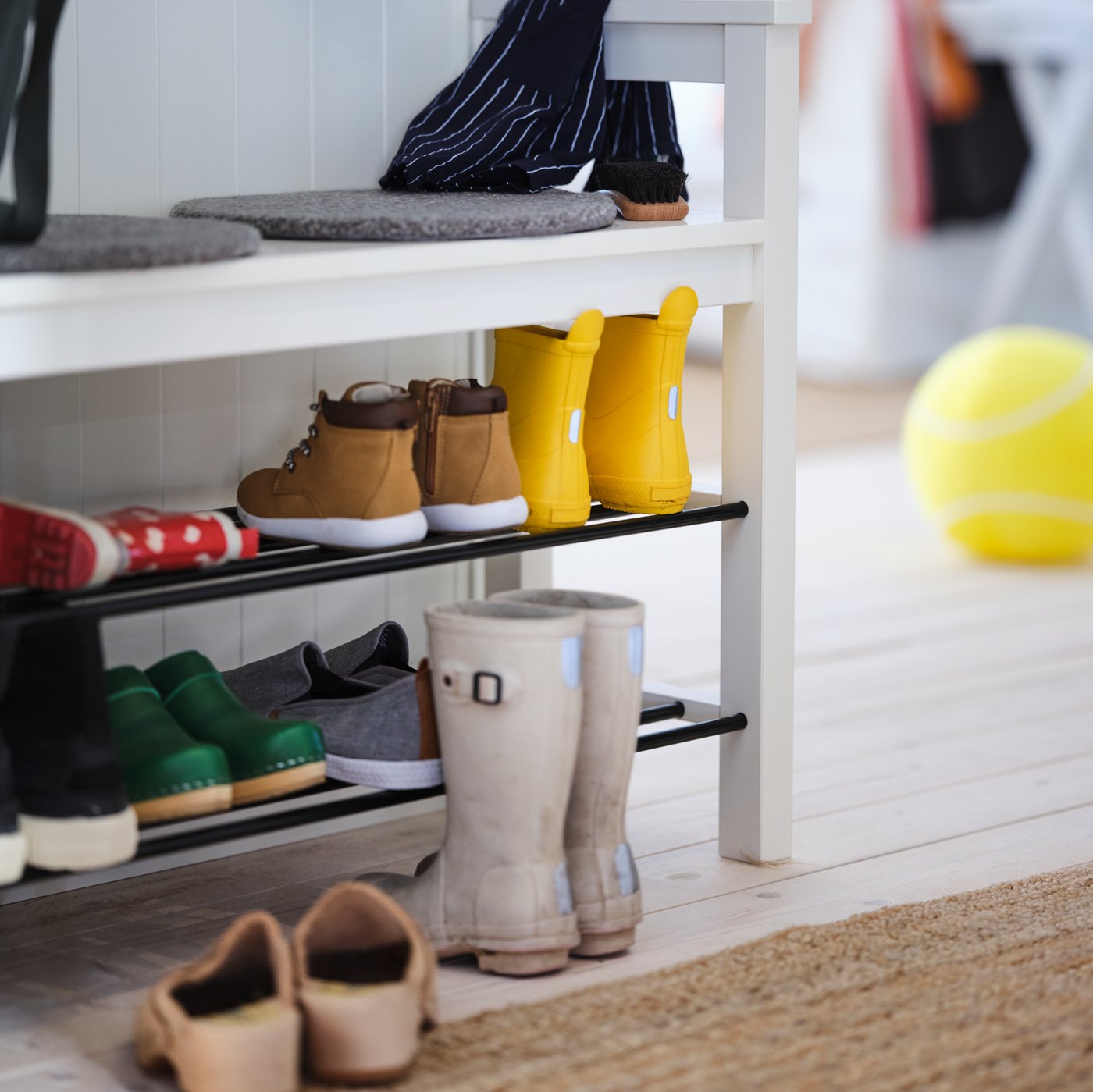 A white HEMNES bench with shoe storage