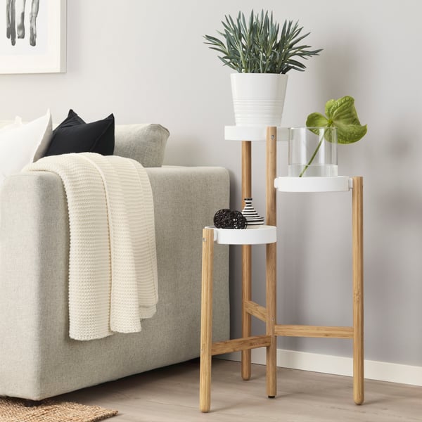 A bamboo/white SATSUMAS plant stand