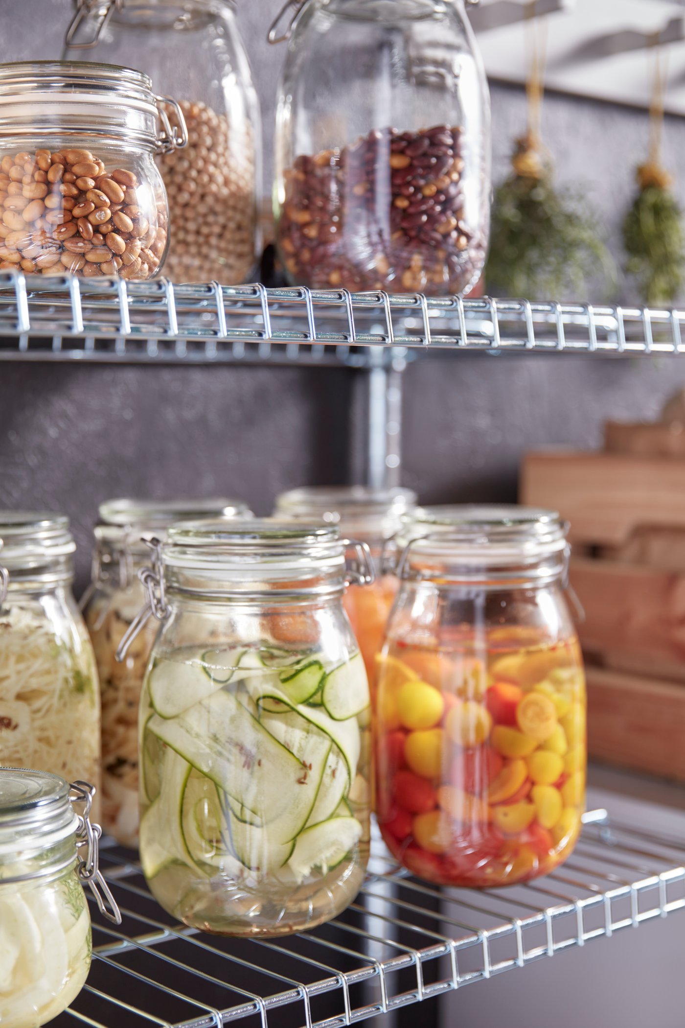 A clear glass KORKEN jar with lid