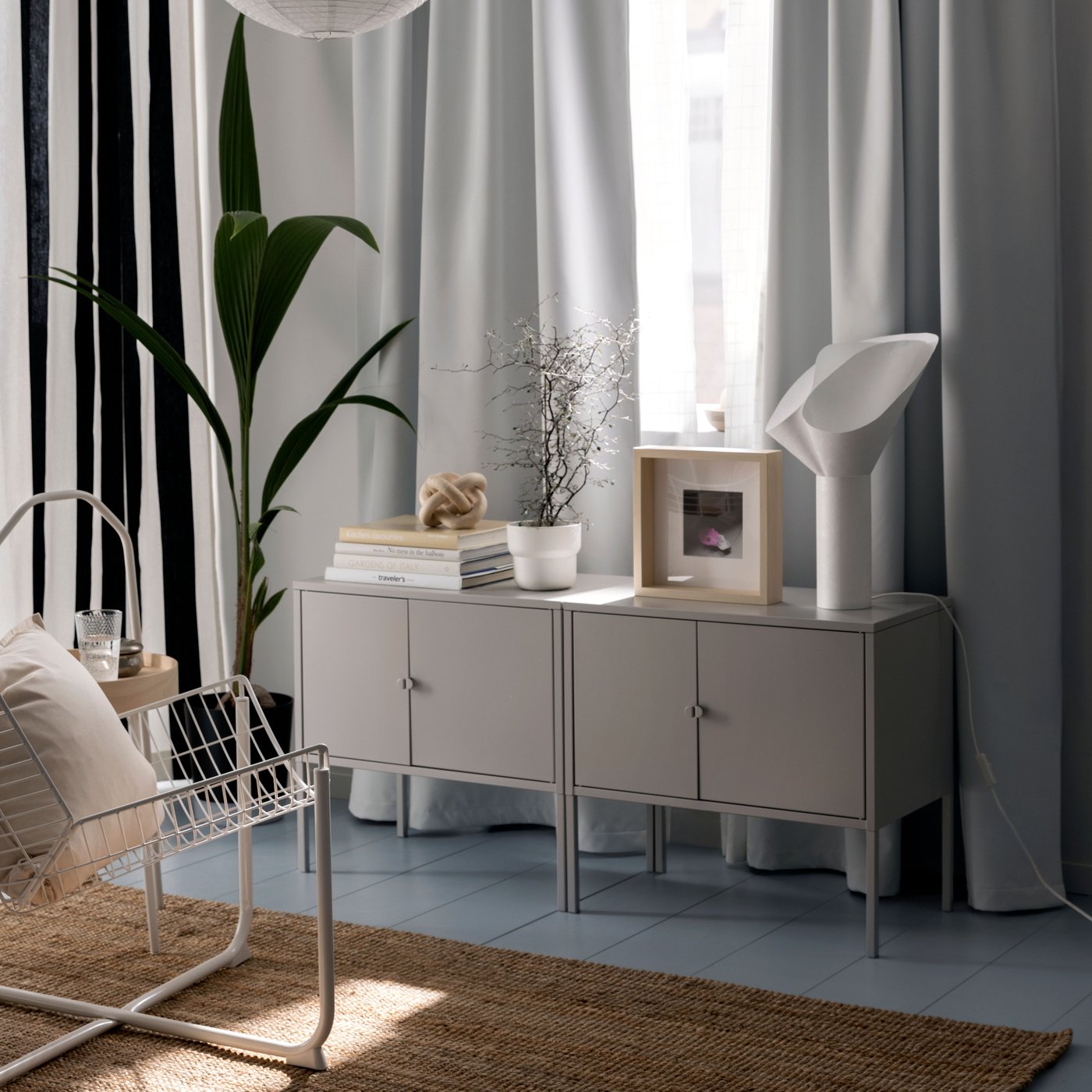 A metal/grey LIXHULT cabinet in the living room