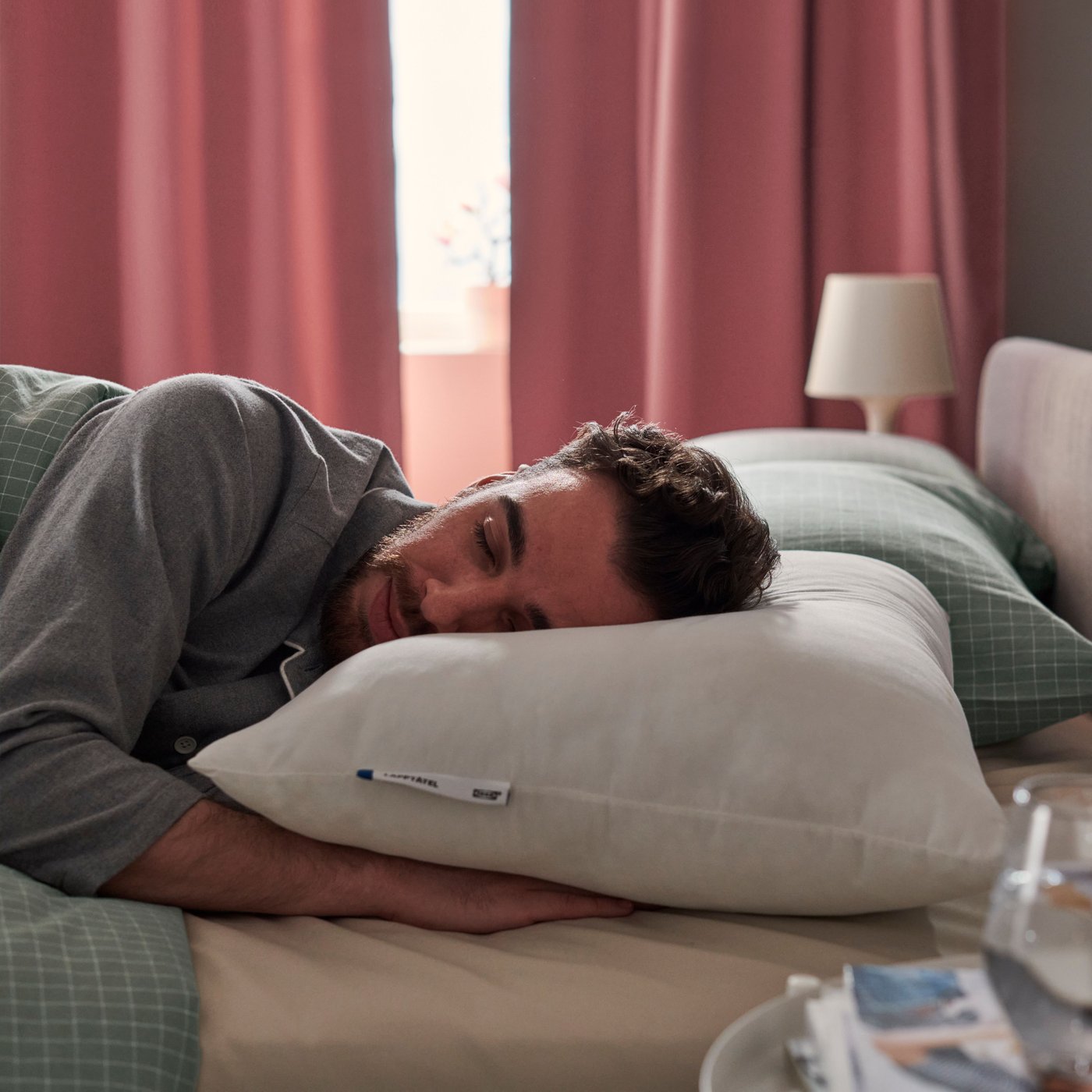 A LAPPTÅTEL pillow, high, side/back sleeper