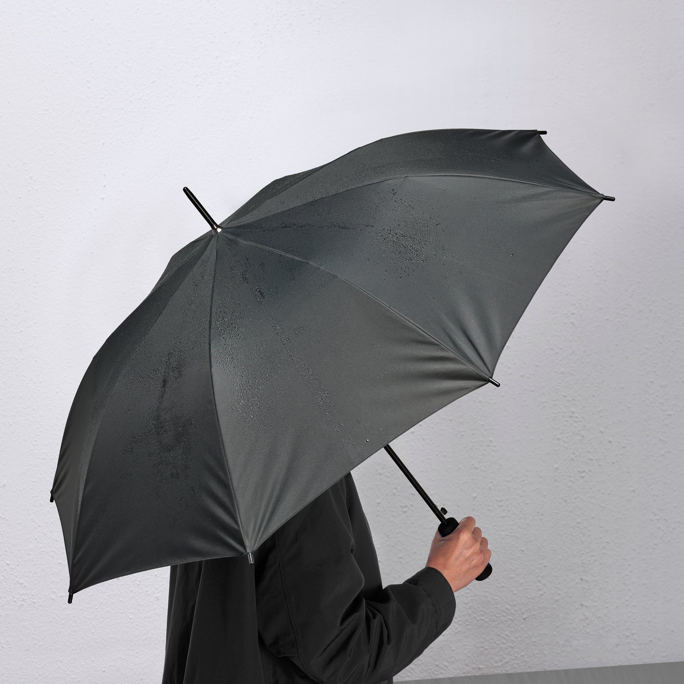 A black KNALLA umbrella