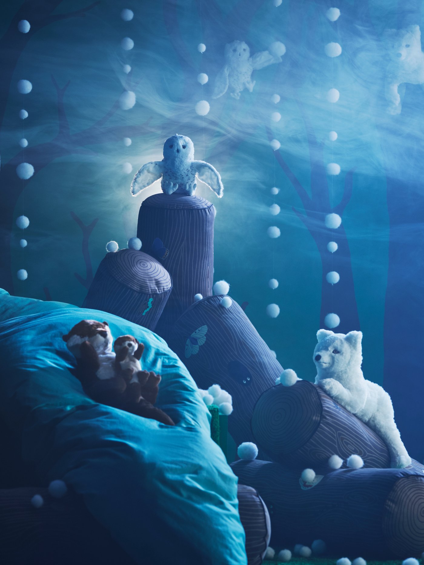 A cylinder shaped/brown SKOGSDUVA cushion