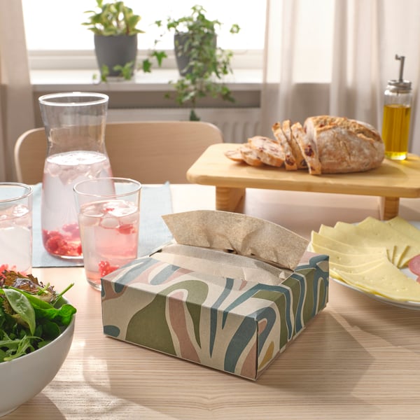 A patterned SLÖJSTJÄRT paper napkin