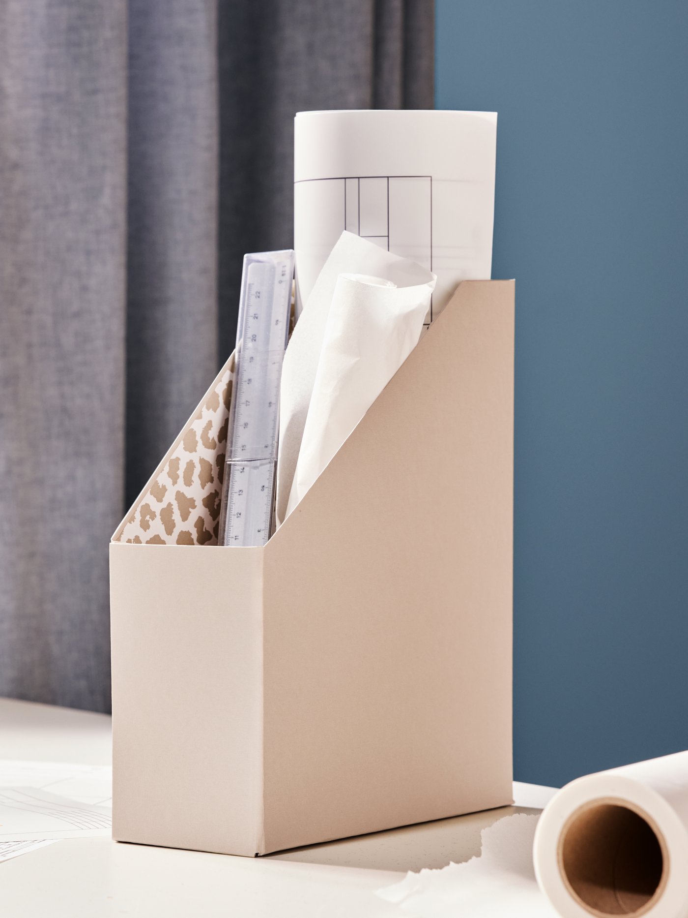 A beige TJENA magazine file in the home office