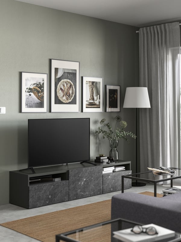 A light brown LANGSTED rug, low pile