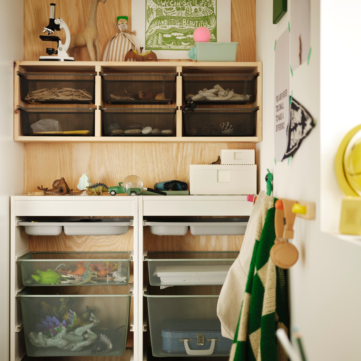 A light white stained pine/dark grey TROFAST wall storage