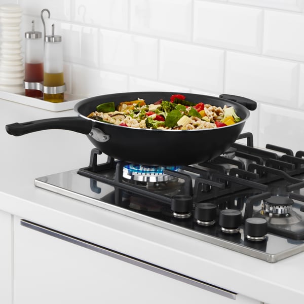 A black TOLERANT wok
