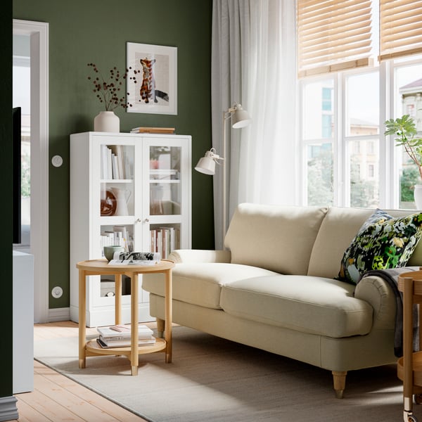 A Knäbäck light beige VALNÄS 2-seat sofa in the living room