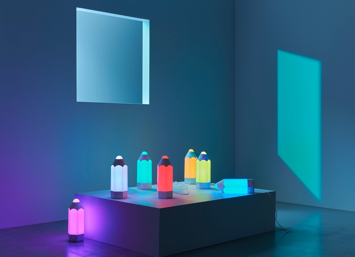 A multicolour PELARBOJ LED table lamp in the childrens room