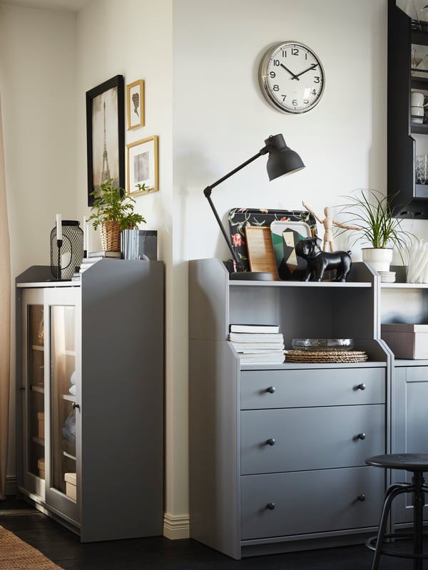 A stainless steel PUGG wall clock in the bedroom