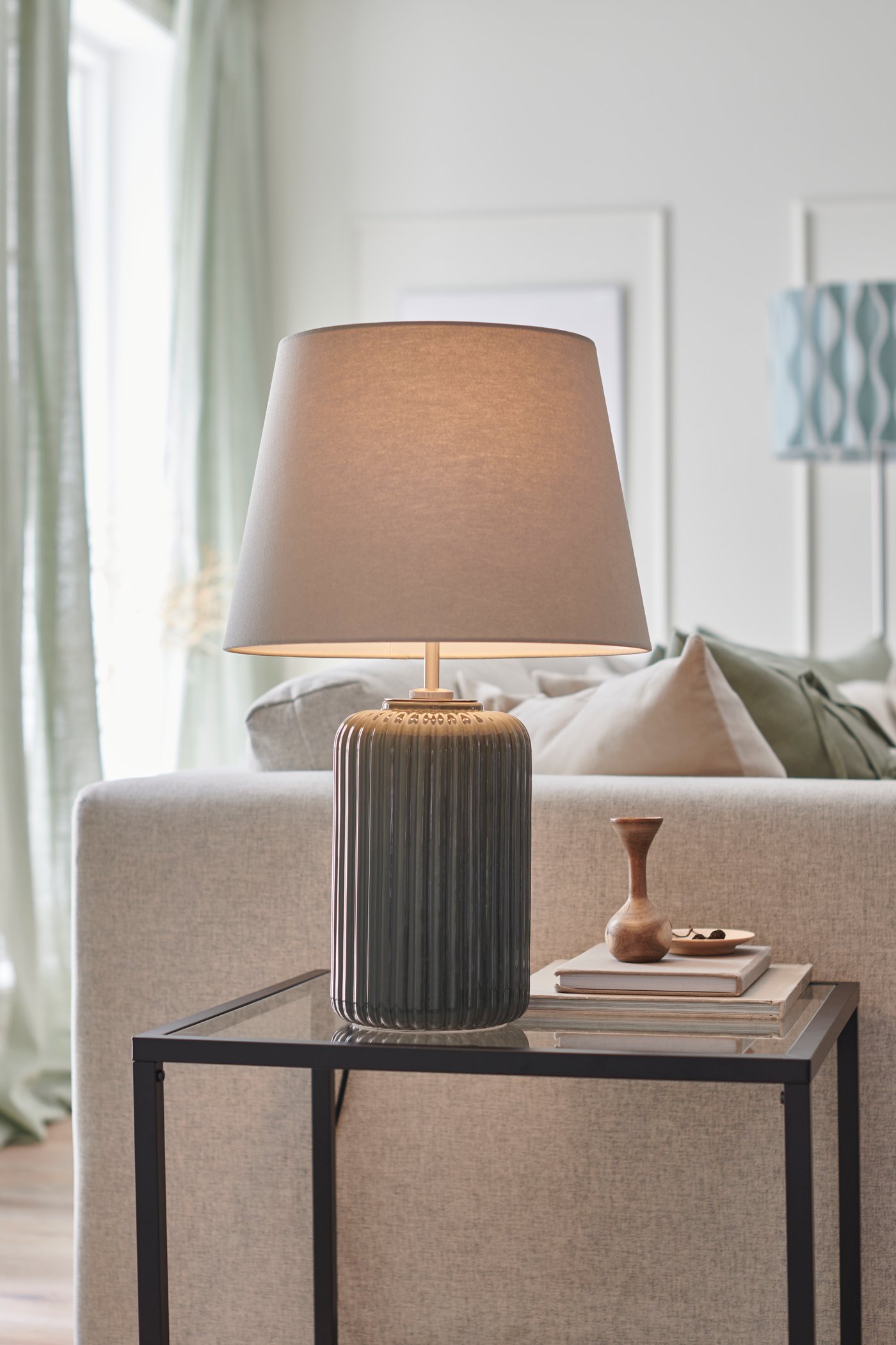 A light green SILVERLÖNN sheer curtains, 1 pair in the living room