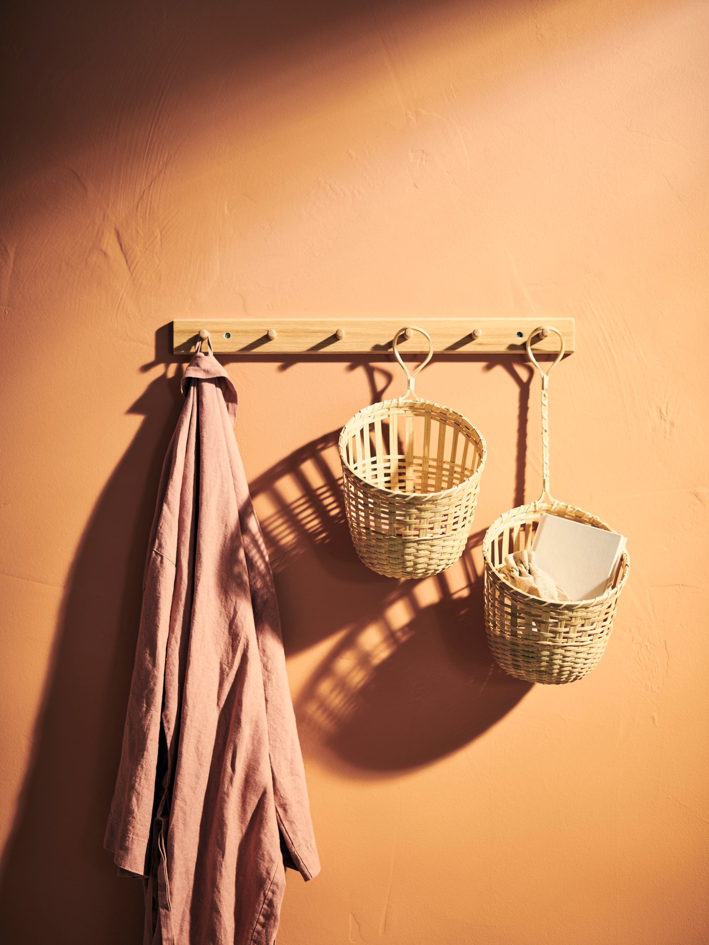 A handmade bamboo TOLKNING basket hanging