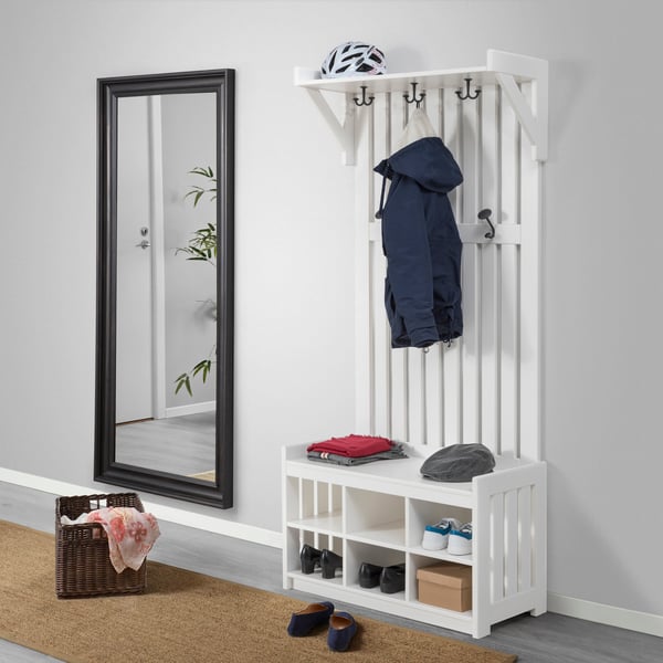 A white PANGET coat rack with shoe storage bench