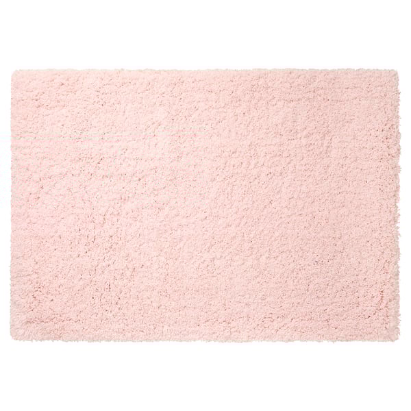 A light pink, rectangular bath mat named ALMTJÄRN. Its soft, made of microfiber with a latex backing for grip.