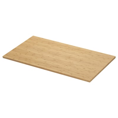 The ÅLSKEN wooden countertop. Its rectangular, light brown, and made from bamboo with a smooth finish. Ideal for kitchen or bathroom use.