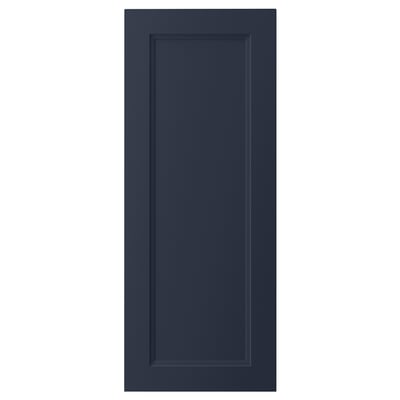 A dark blue AXSTAD kitchen cabinet door with a smooth, rectangular design and inset panel. Its made from fibreboard with a plastic foil front.
