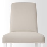 A sleek, upholstered dining chair in beige with high back and white legs, designed for comfort and easy cleaning.