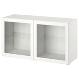 White BESTÅ cabinet with glass doors, featuring sleek design and modern storage.