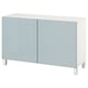 Displays a light blue and white BESTÅ sideboard with two doors and adjustable shelves, offering ample storage.