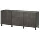 Dark grey BESTÅ storage unit. Wide, rectangular, three-section design with cabinet and drawer storage, sleek handles.