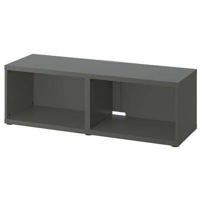 Gray BESTÅ tv bench with minimalist design, open storage compartments, and adjustable feet.