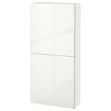 White BESTÅ tall cabinet, sleek modern design, wall-mounted storage.
