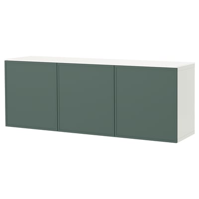 A white and green BESTÅ cabinet with three doors.