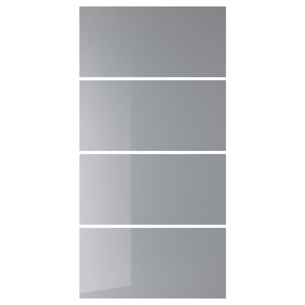 Four frosted glass wardrobe doors, grey, tempered with enamel, offer a subdued view.