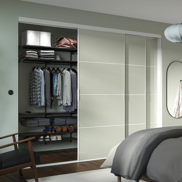 Modern closet with light gray storage, space-efficient, customizable.