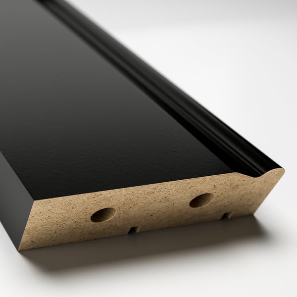 Black kitchen plinth with a textured, speckled edge. Two small circular cutouts are present.