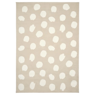 BOGENSE rug, beige with white dots, square shape, playful design.