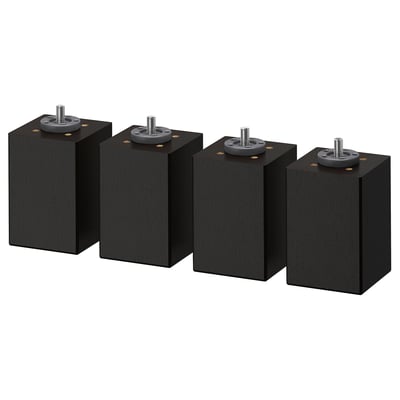 Four black wooden furniture legs with adjustable feet for stability.