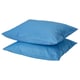 Two stacked square blue DVALA cotton pillowcases with envelope closure.
