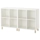 White EKET shelving unit with six compartments and four wooden legs.