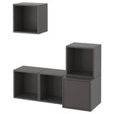 Three black cubic shelves arranged in different sizes, mounted on a white background.