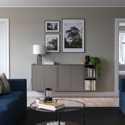 A gray EKET wall-mounted storage unit with both open and closed cabinets.