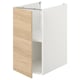 White ENHET cabinet with light wood door and single shelf.