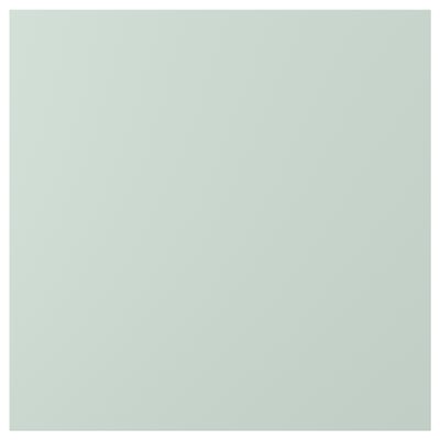 A pale grey-green ENHET cabinet door with a smooth surface and rectangular shape. The door is made of particleboard and covered with plastic foil.