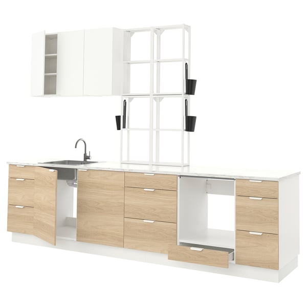 Modern kitchen setup with wooden cabinets, stainless steel sink, and open shelving.
