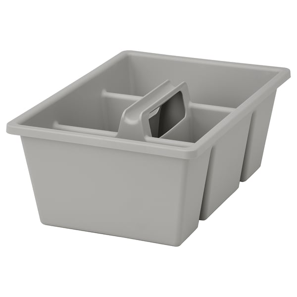 A gray, rectangular FÅNGGRÖDA drawer organizer made of recycled polypropylene plastic. It four compartments and a handle for easy carrying.